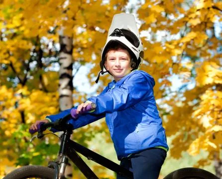 Boy biking Stock Photos