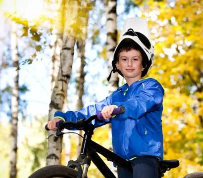 Boy biking Stock Photos