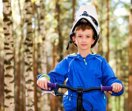Boy biking Stock Photos