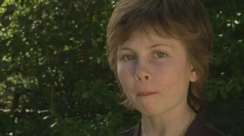 Boy Bites Apple Stock Footage