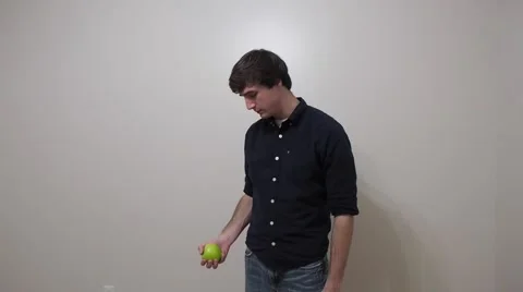 Boy biting green apple eating healthy fruit Stock Footage 46763340