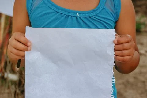 Boy with blank sheet to give message Stock Photos