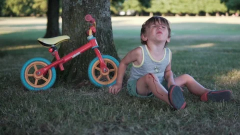 Boy with blood on the knee Stock Footage 95085172