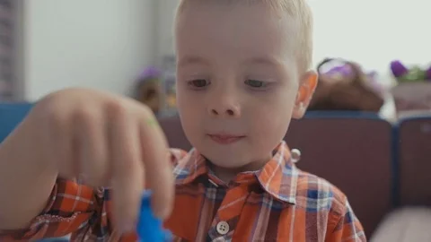 Boy blowing up the soap bubbles Stock Footage 73683357