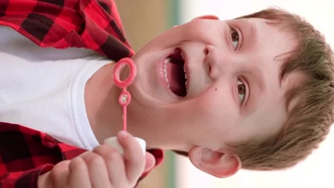 Boy blowing soap bubbles, happy child kid, peaceful childhood bubbles, pure Stock Footage 308319952