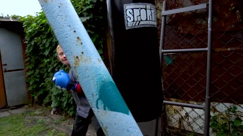 Boy in blue boxing gloves Stock Footage 207771484