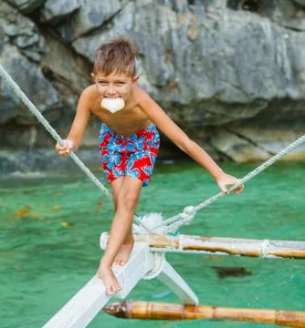 Boy on the boat Foto stock