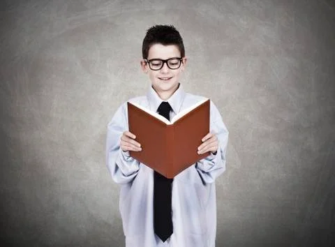 Boy with book Stock Photos