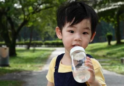 Boy with bottle Foto stock