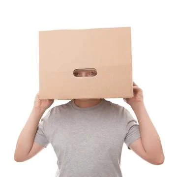 Boy with a box on a head Stock Photos