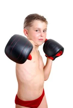 Boy boxer throwing a punch Stock Photos