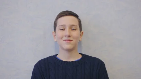 Boy with braces smiling Stock Footage 60642461