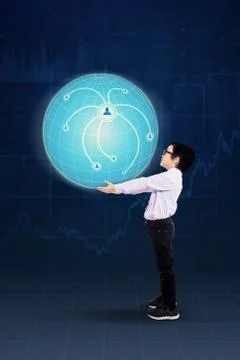 Boy bringing 3d globe Stock Photos