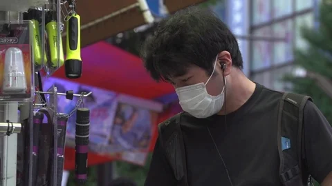 Boy Browsing a shop, Tokyo Stock Footage 74167954