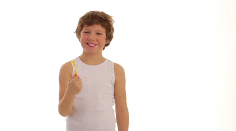 Boy brushes his teeth Stock Footage 24633848