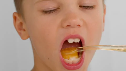 The boy is brushing his teeth. Stock Footage 278509714