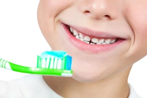 Boy is brushing his teeth. isolated Stock Photos