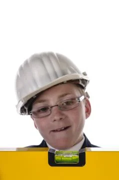 Boy with bubble level Stock Photos