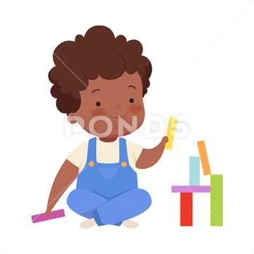 Boy is building from colorful blocks. Vector illustration on a white background. Stock Illustration