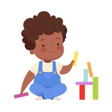 Boy is building from colorful blocks. Vector illustration on a white background. Stock Illustration