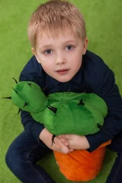 Boy with cactus Stock Photos