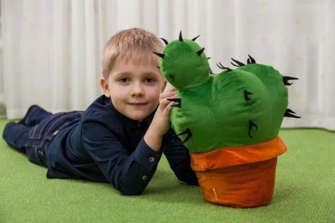 Boy with cactus Foto stock