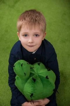 Boy with cactus Stock Photos