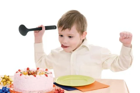 Boy with cake Stock Photos