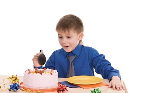 Boy with cake Stock Photos