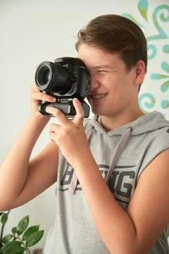 A boy with camera in his hands Foto stock