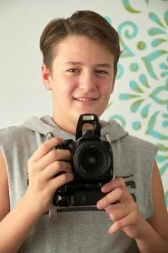 A boy with camera in his hands Foto stock