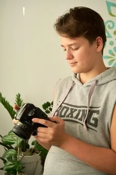 A boy with camera in his hands 스톡 사진