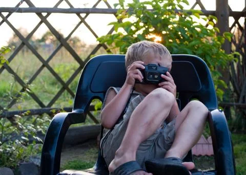 The boy with a camera Stock Photos