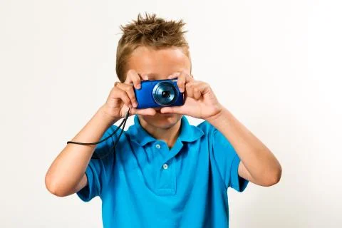 Boy with camera Stock Photos