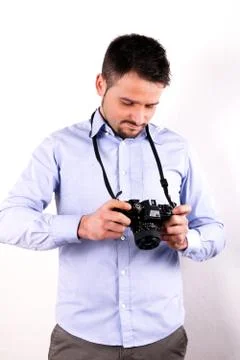 Boy with camera Stock Photos
