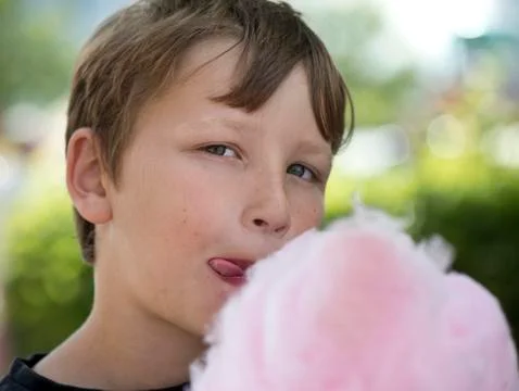 Boy with candyfloss Stock Photos