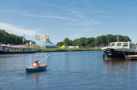 Boy in canoe Stock Photos