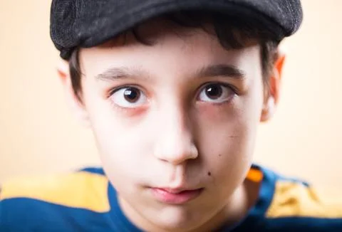 Boy with cap Stock Photos