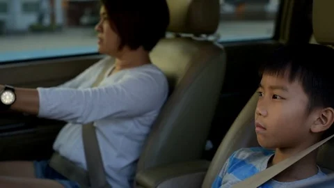Boy in a car on traffic jam road Stock Footage 85076480