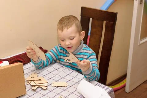 Boy with a cardboard box Stock Photos