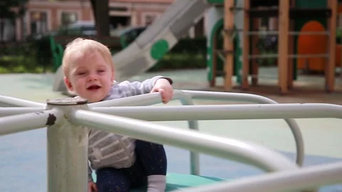 Boy on the carousel Video stock 134256758