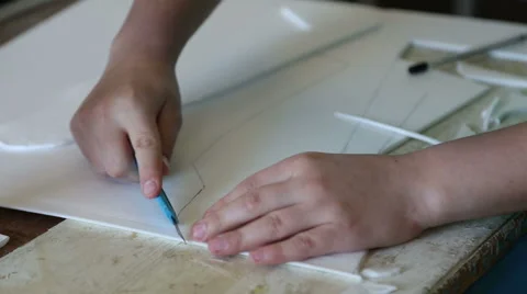 The boy carves model airplane Stock Footage 59112830