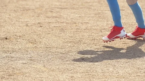A boy catches and throws the baseball in the infield at little league baseball p Stock Footage 70450330