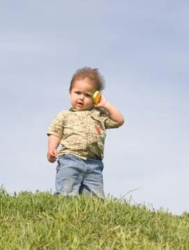Boy with a cellphone Stock Photos