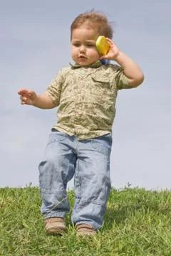 Boy with a cellphone Stock Photos