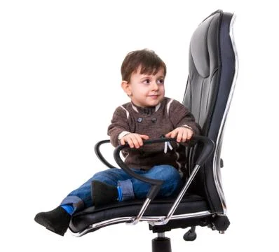 Boy on chair Stock-Fotos