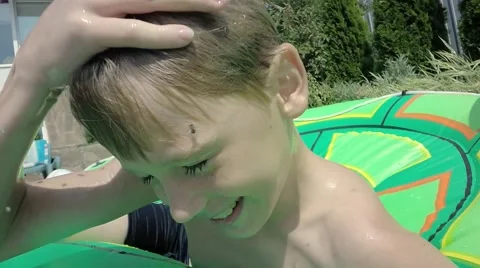 The boy chased a fly. Moving the camera. Slow motion 库存影片 66285123