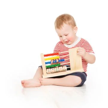 Boy child with abacus clock counting, little kid study lesson, education Stock Photos