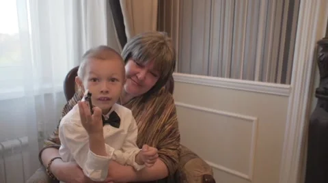 Boy child with a babysitter Stock Footage 57130647