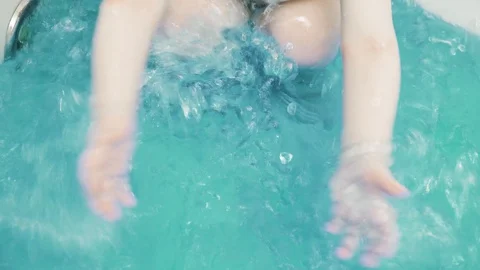 Boy child bathes in bath Stock Footage 129573244